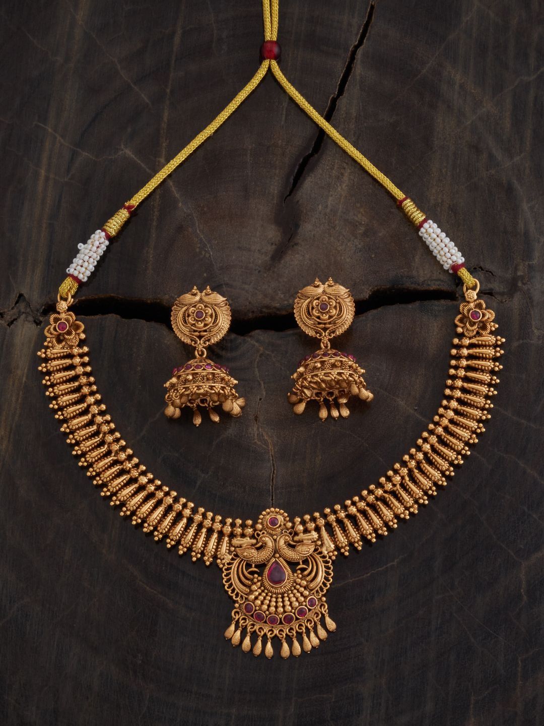 

Kushal's Fashion Jewellery Gold Plated Antique Ruby Stone Studded Jewellery Set