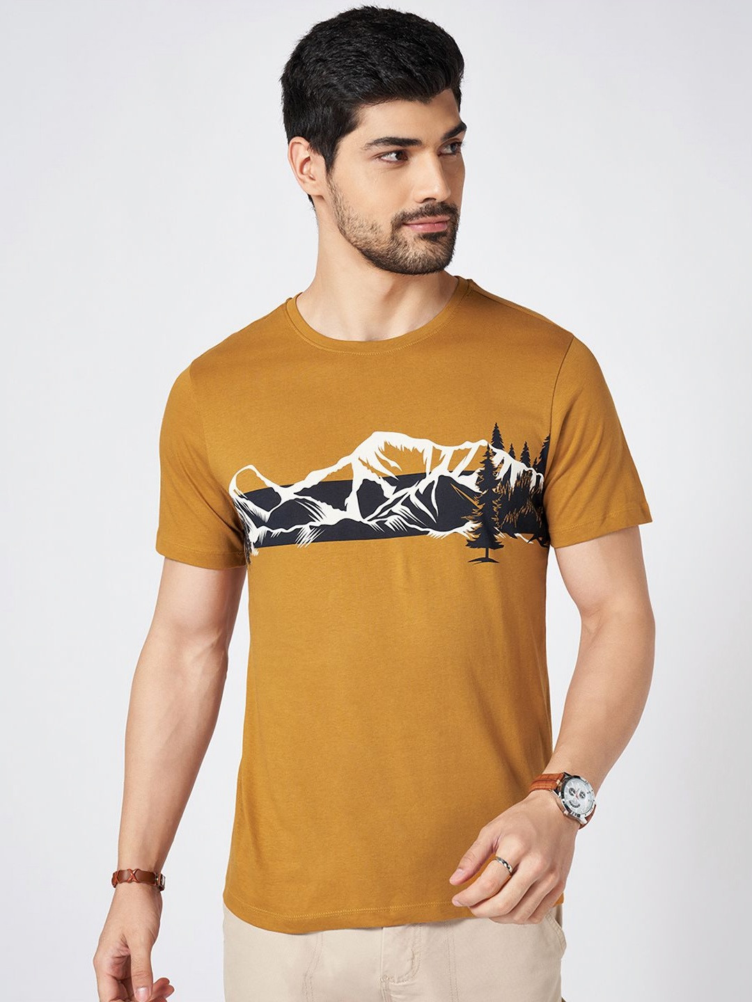 

Urban Ranger by pantaloons Men Abstract Printed Round Neck Cotton Slim Fit T-Shirt, Mustard
