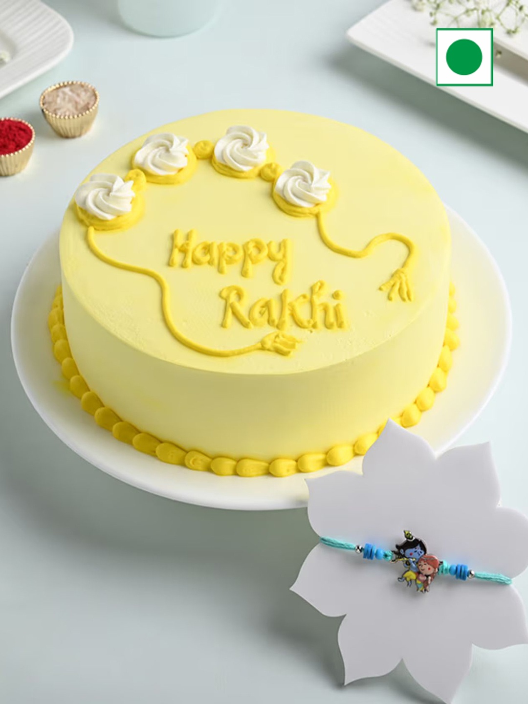 

Floweraura Set Of 2 Krishna Kids Rakhi With Pineapple Cake Gift Set-800g, Blue