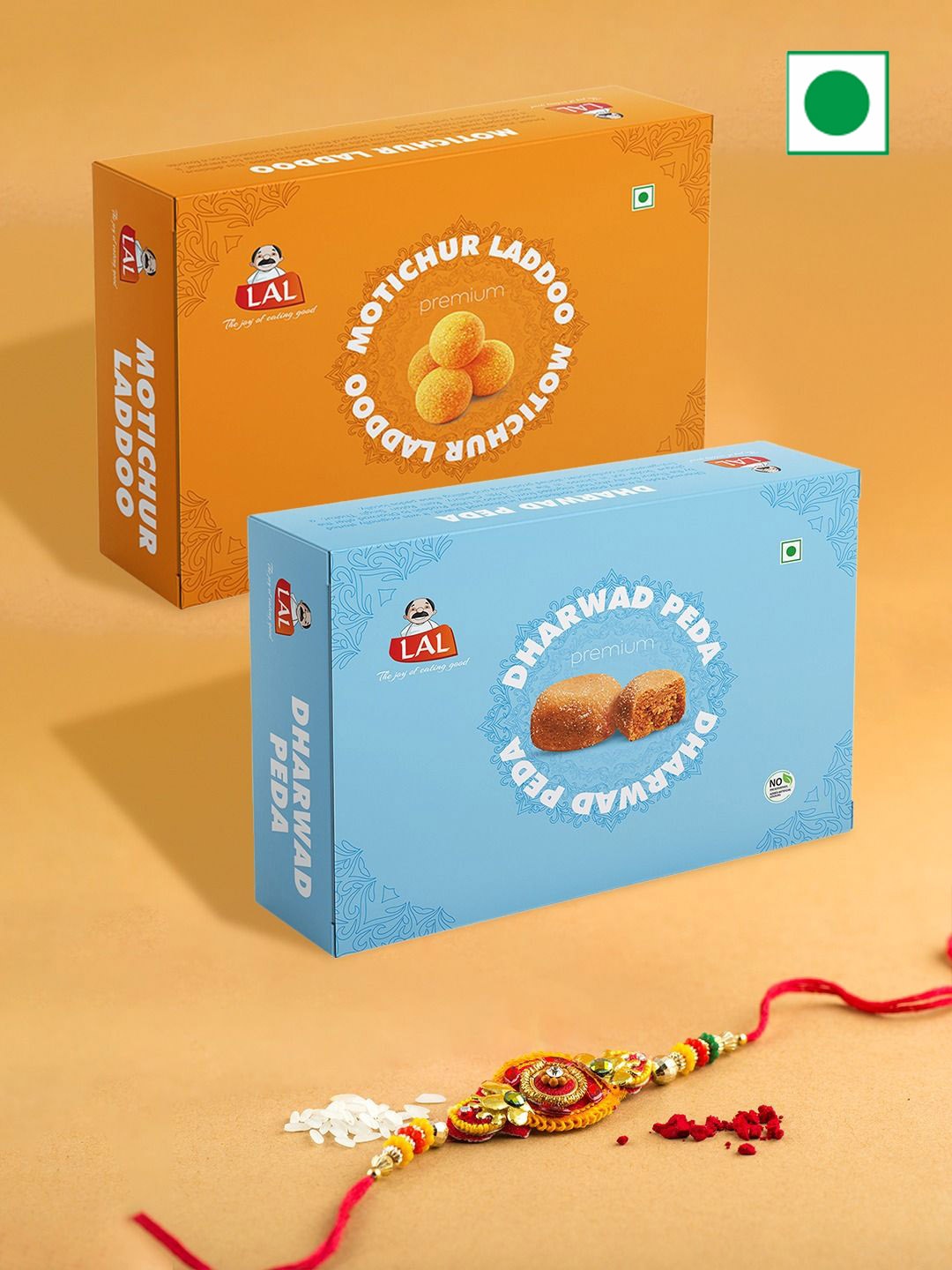 

LAL Rakhie & Dharwad Peda, Motichur Laddoo With Roli Chawal Sweets Gifts - 800g, Gold