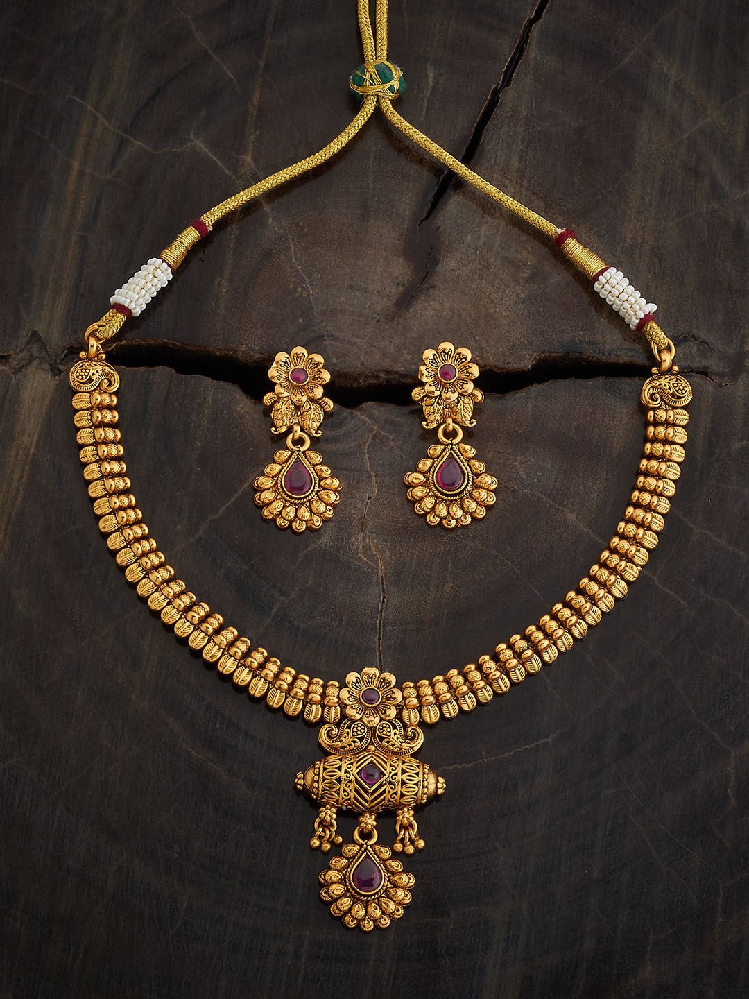 

Kushal's Fashion Jewellery Gold Plated Ruby Studded Ethnic Antique Jewellery Set