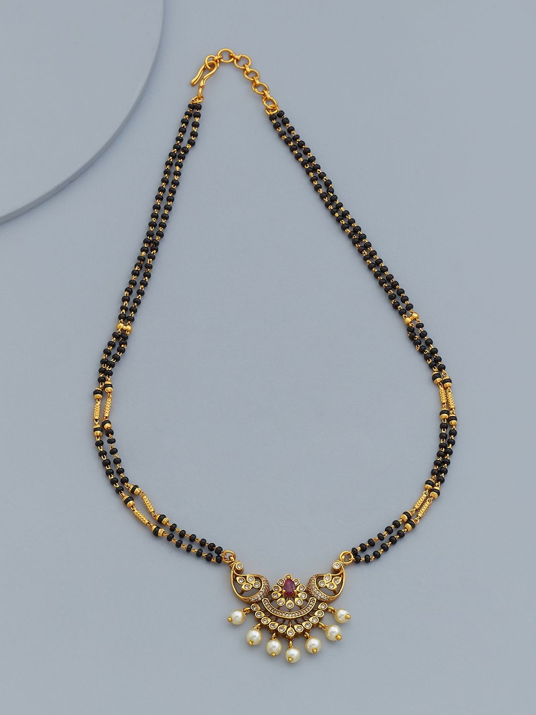 

Kushal's Fashion Jewellery Gold-Plated Stone Studded & Beaded Antique Mangalsutra