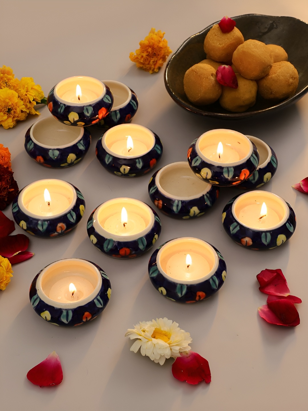 

VarEesha Blue & Red Candle Holder