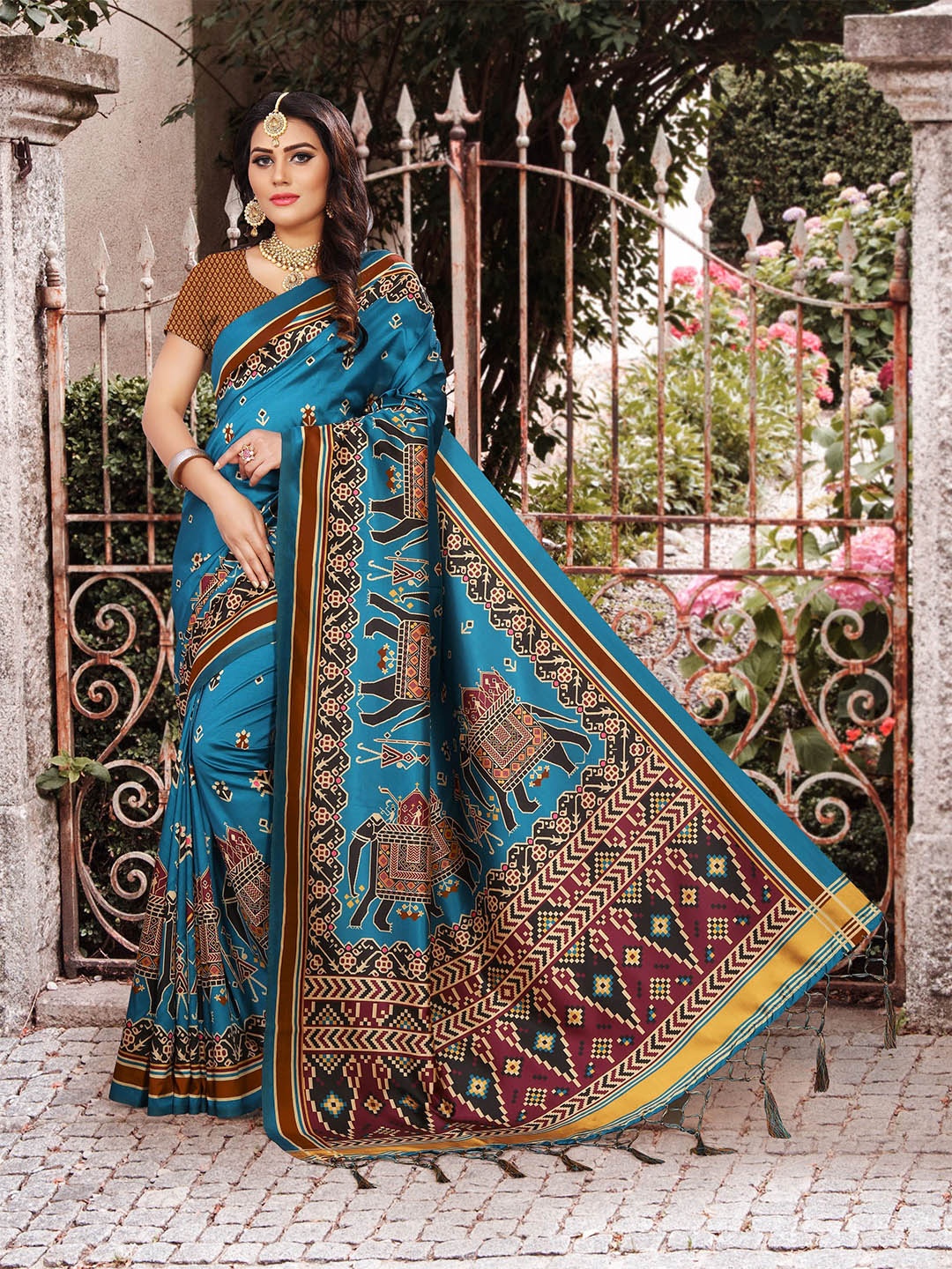 

Kaizen TEXO FAB Ethnic Motifs Patola Saree, Teal