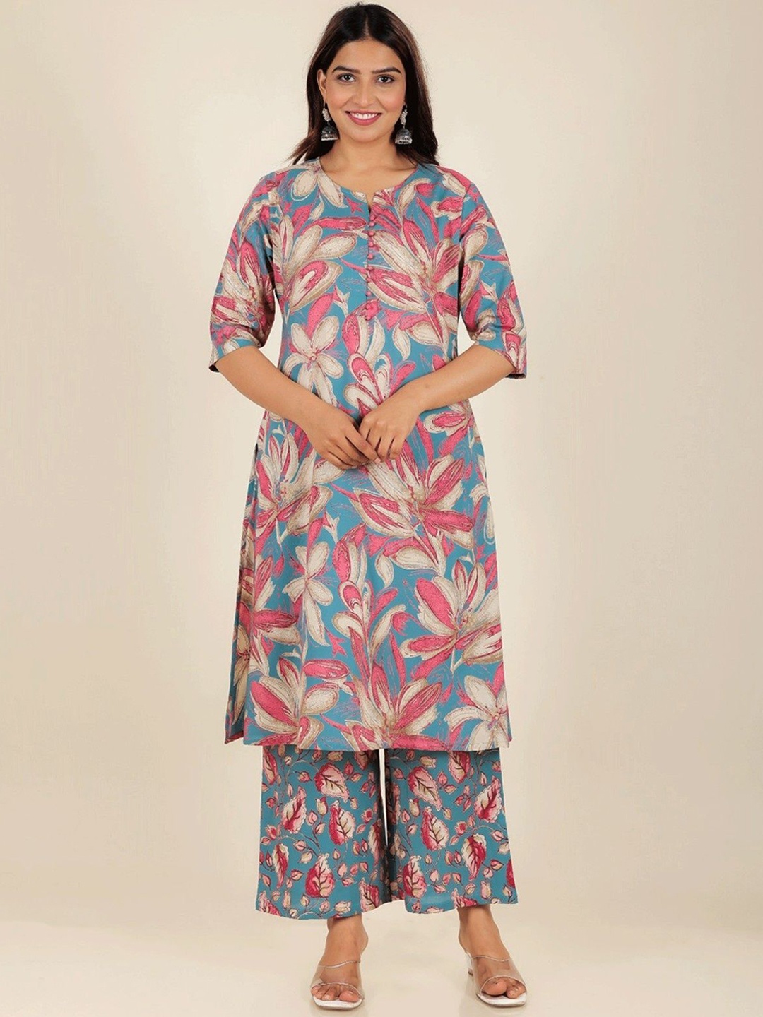

Aramya Women Floral Printed Regular Beads and Stones Pure Cotton Kurta with Palazzos, Blue