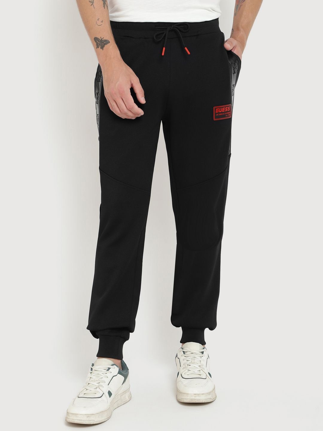 

GUESS Men Mid-Rise Solid Printed Joggers, Black