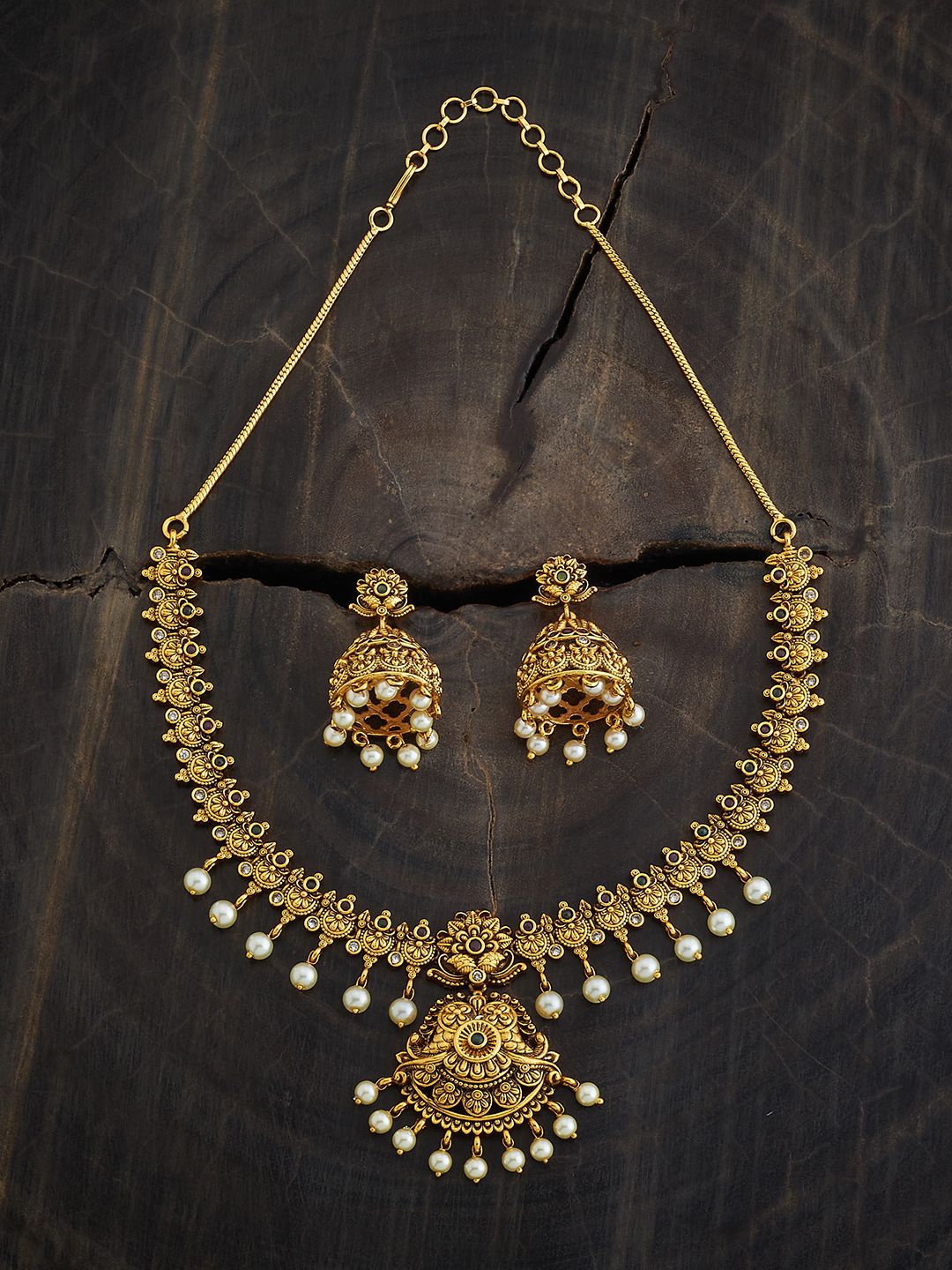 

Kushal's Fashion Jewellery Gold Plated Ruby Studded & Beaded Ethnic Antique Jewellery Set