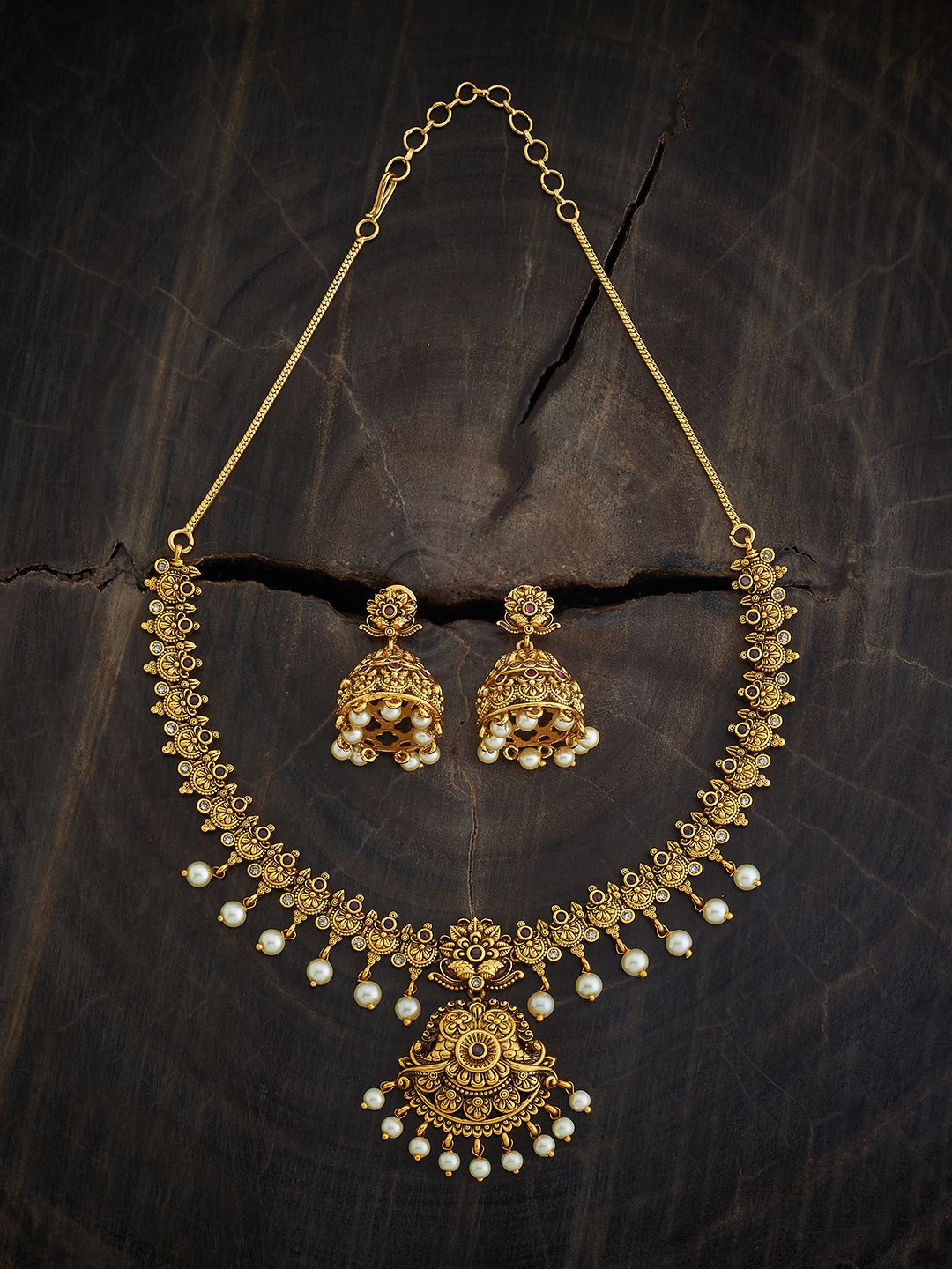 

Kushal's Fashion Jewellery Gold Plated Stone Studded & Beaded Antique Jewellery Set