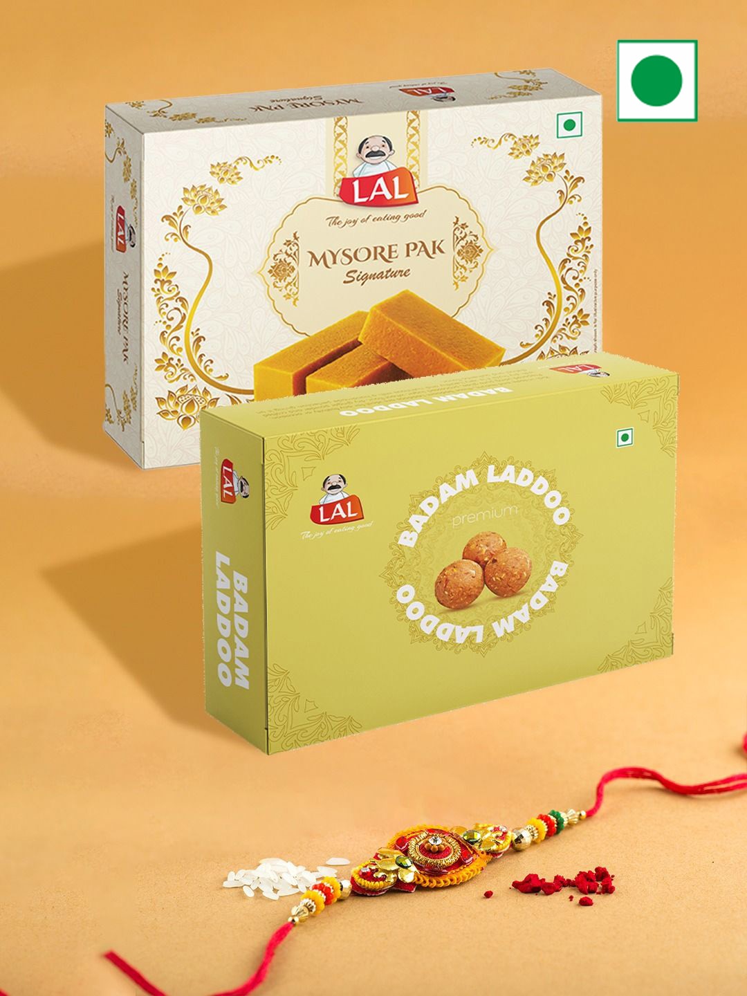 

LAL Rakhi With Lal Sweets Mysore Pak & Badam Laddoo Sweet Gifts, Red