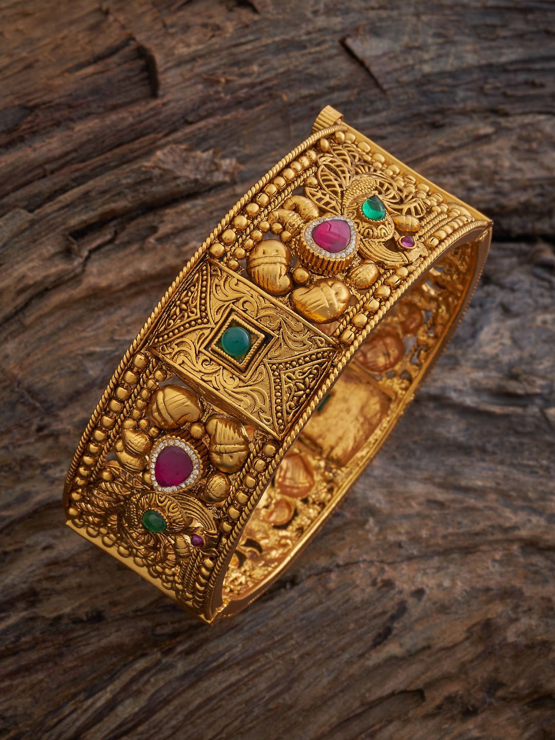 

Kushal's Fashion Jewellery Gold-Plated Ruby Stones Studded Antique Bangle