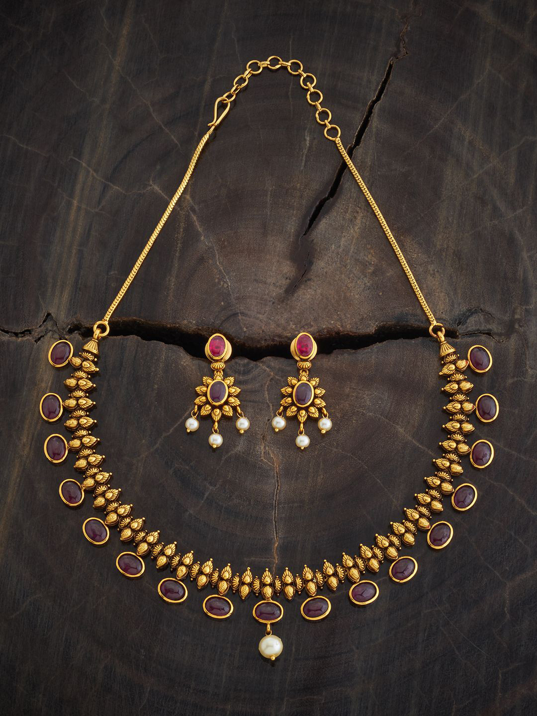

Kushal's Fashion Jewellery Gold-Plated Ruby Stone-Studded & Beaded Antique Jewellery Set