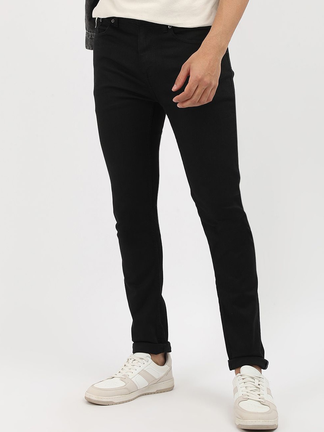 

Tommy Hilfiger Men Mid-Rise Slim Fit Stretchable Jeans, Black