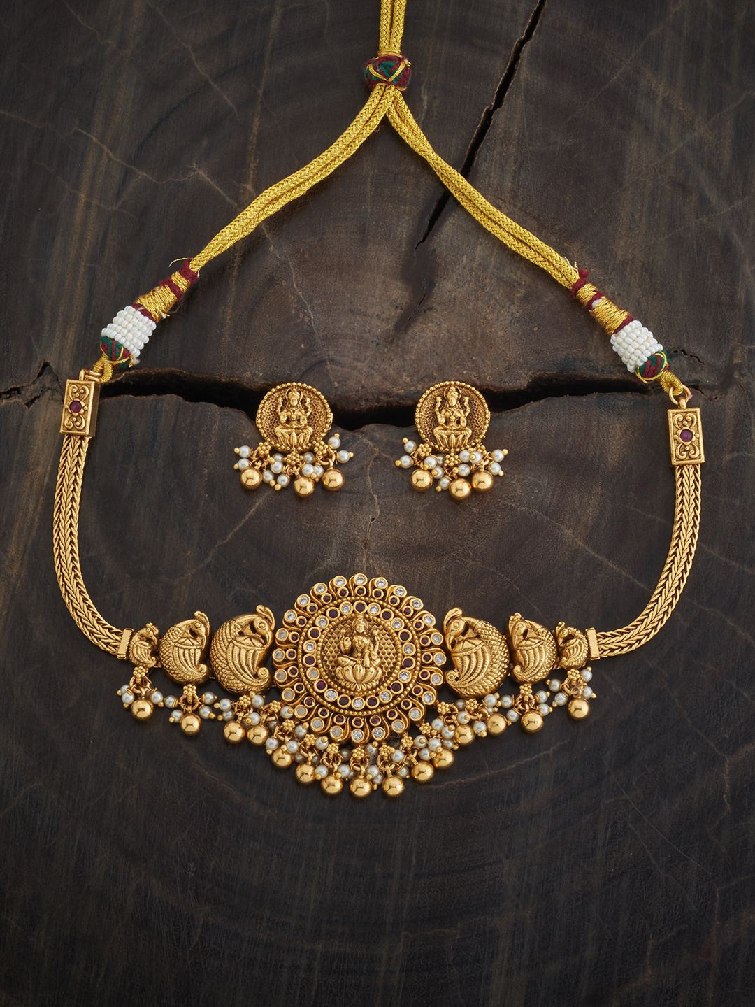 

Kushal's Fashion Jewellery Gold-Plated Stones Studded & Beaded Temple Jewellery Set