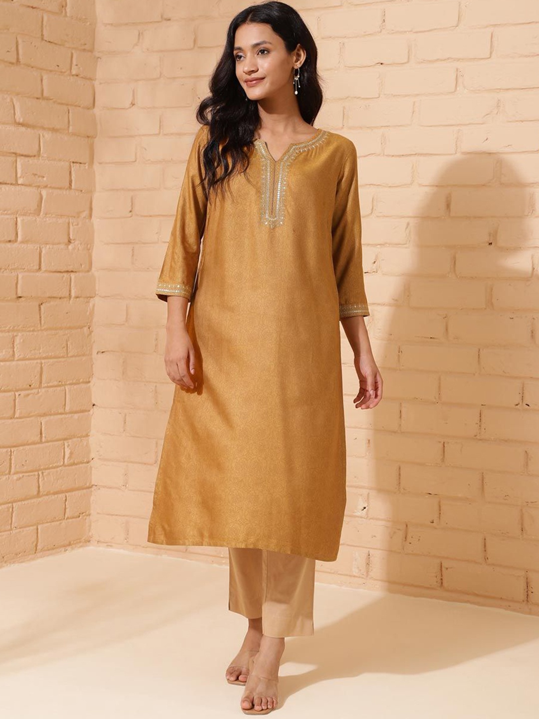 

Fabindia Notch Neck Thread Work A-Line Kurta, Yellow