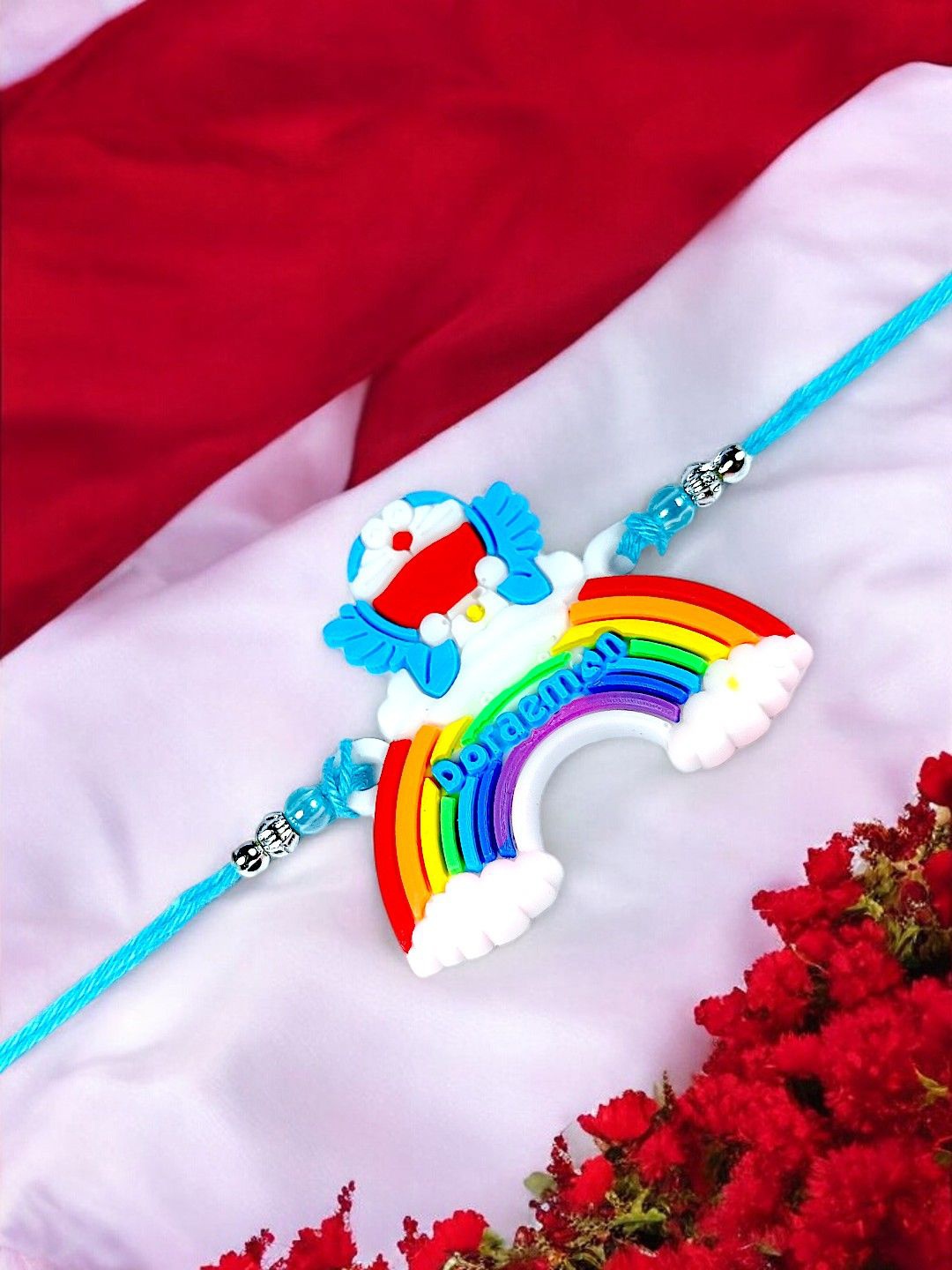 

ADIVA Doraemon Thread Rakhi With Roli Chawal, Silver