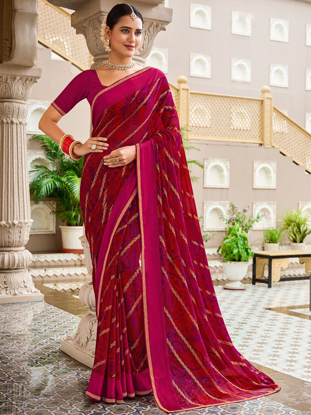 

Laxmipati women Ethnic Motifs Saree with blouse piece, Maroon