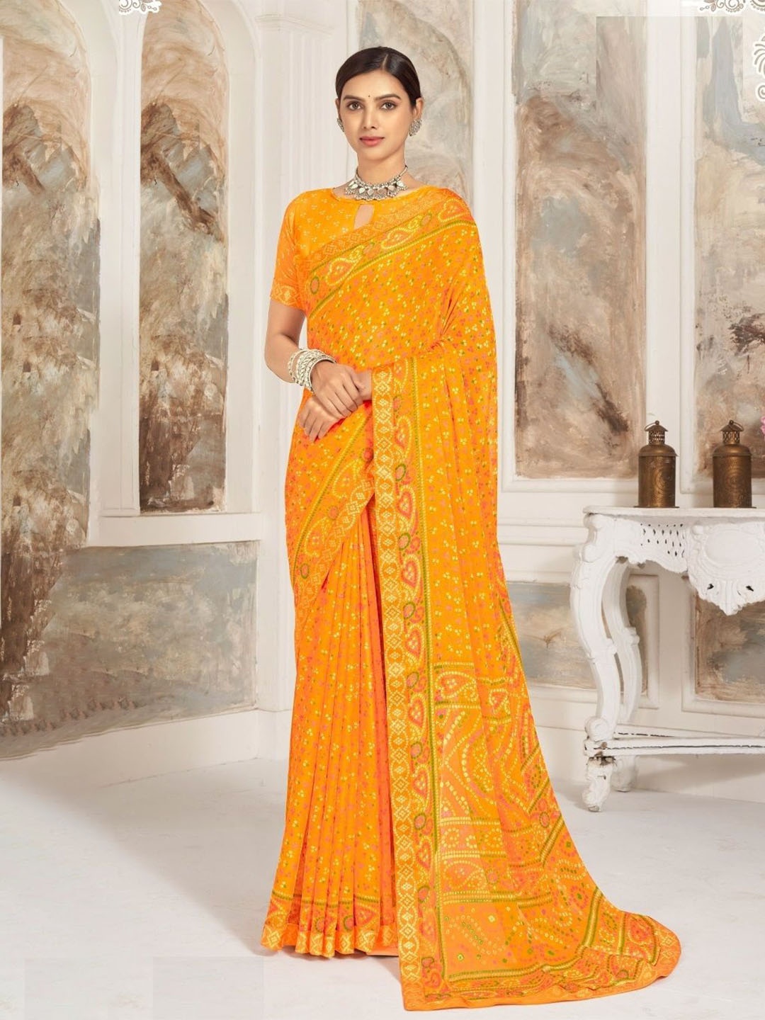 

Reboot Fashions Bandhani Pure Chiffon Saree, Mustard