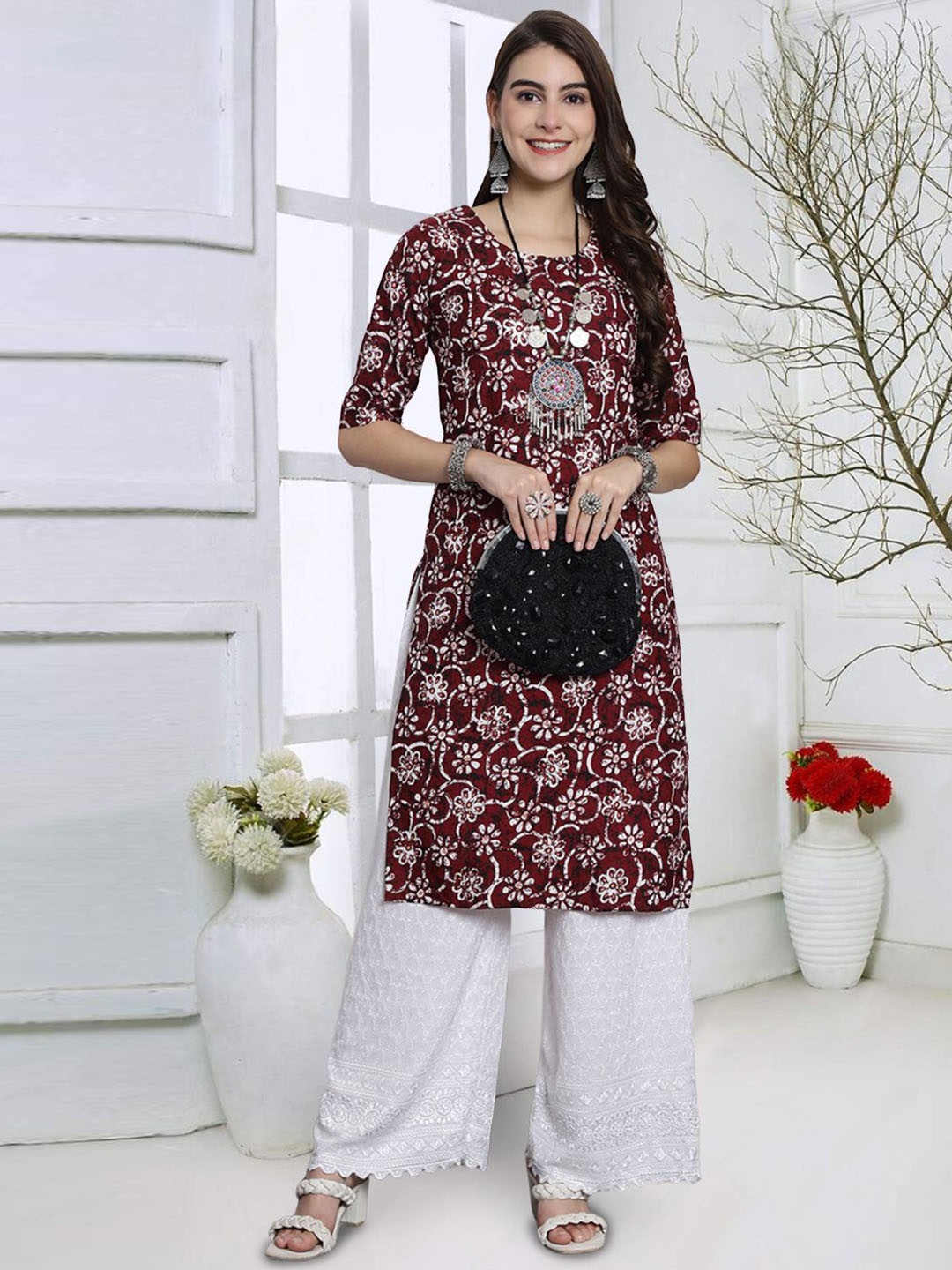 

KALINI Floral Printed Round Neck Straight Kurta, Maroon