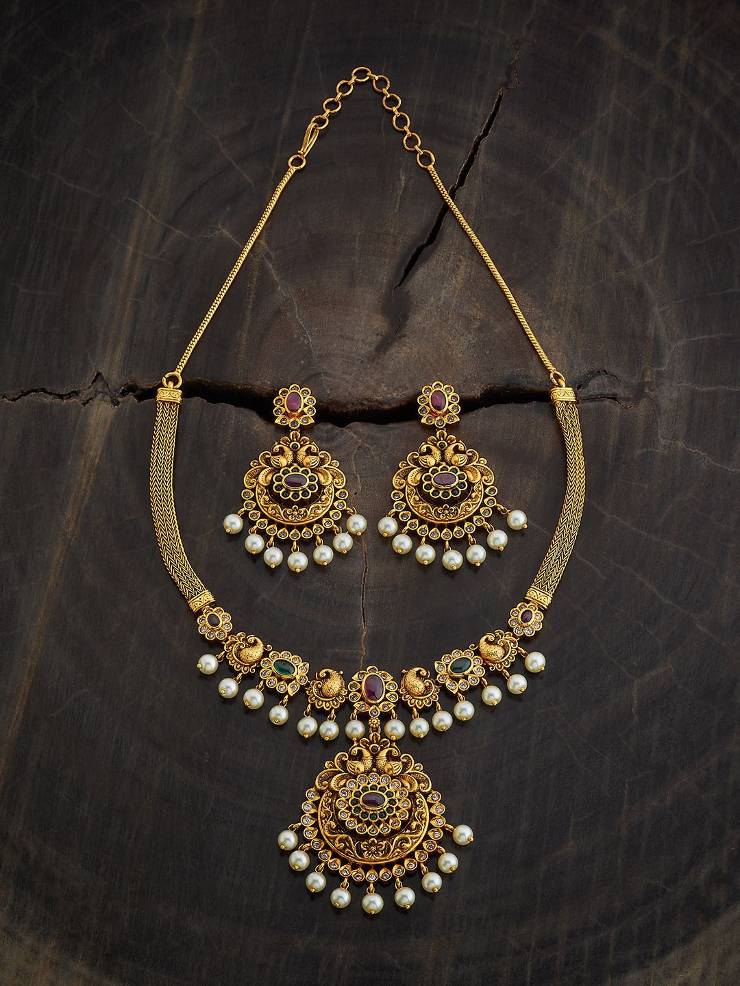 

Kushal's Fashion Jewellery Gold-Plated Ruby-Studded & Beaded Ethnic Antique Jewellery Set