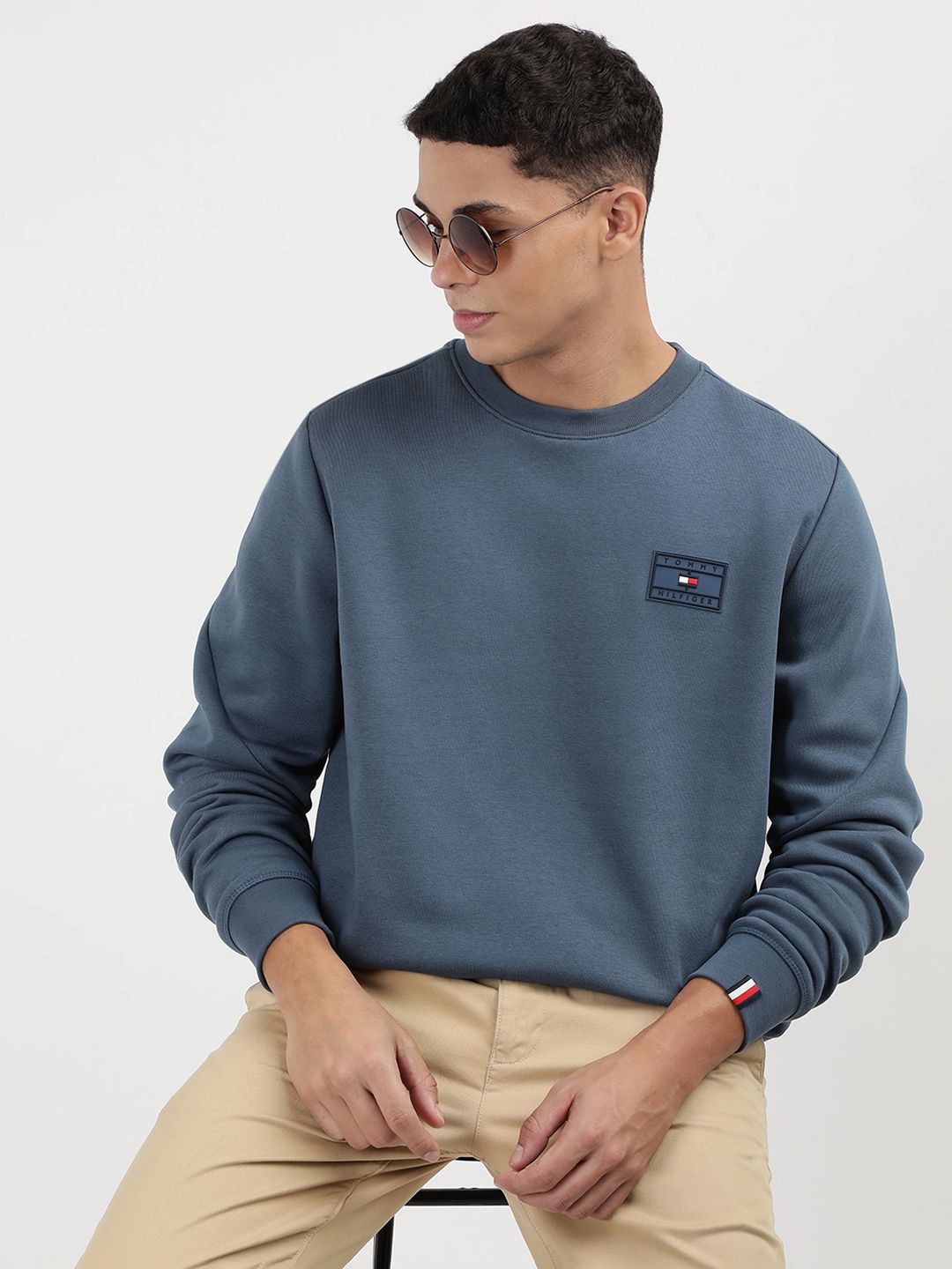 

Tommy Hilfiger Men Solid Round Neck Sweatshirt, Blue