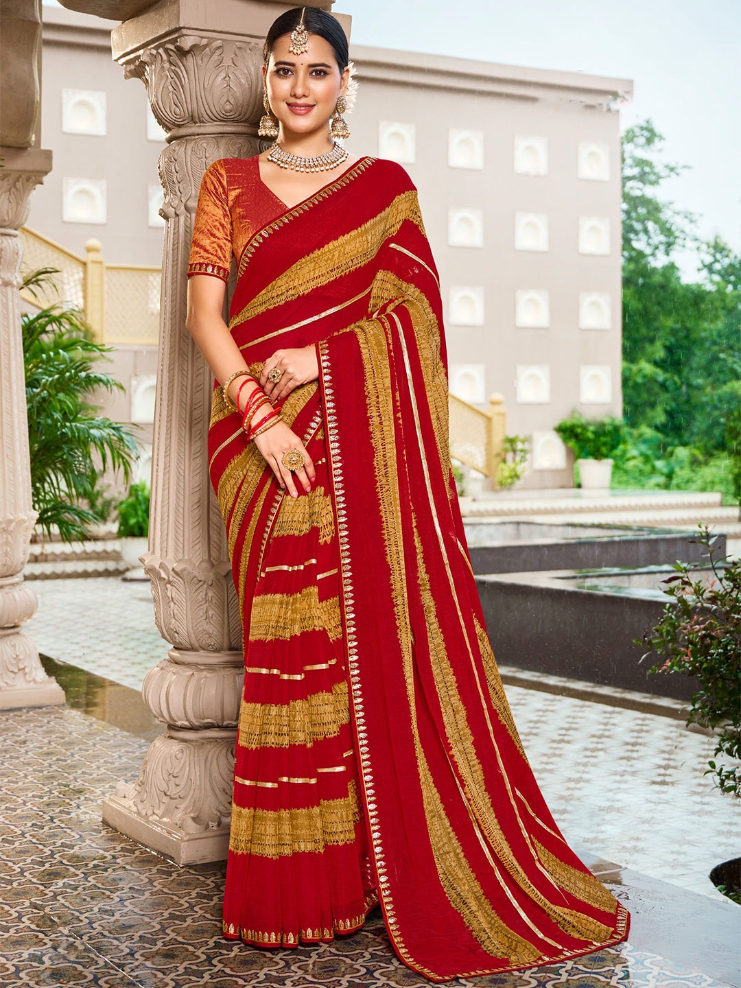 

Laxmipati Sequinned Poly printed Chiffon Saree, Red