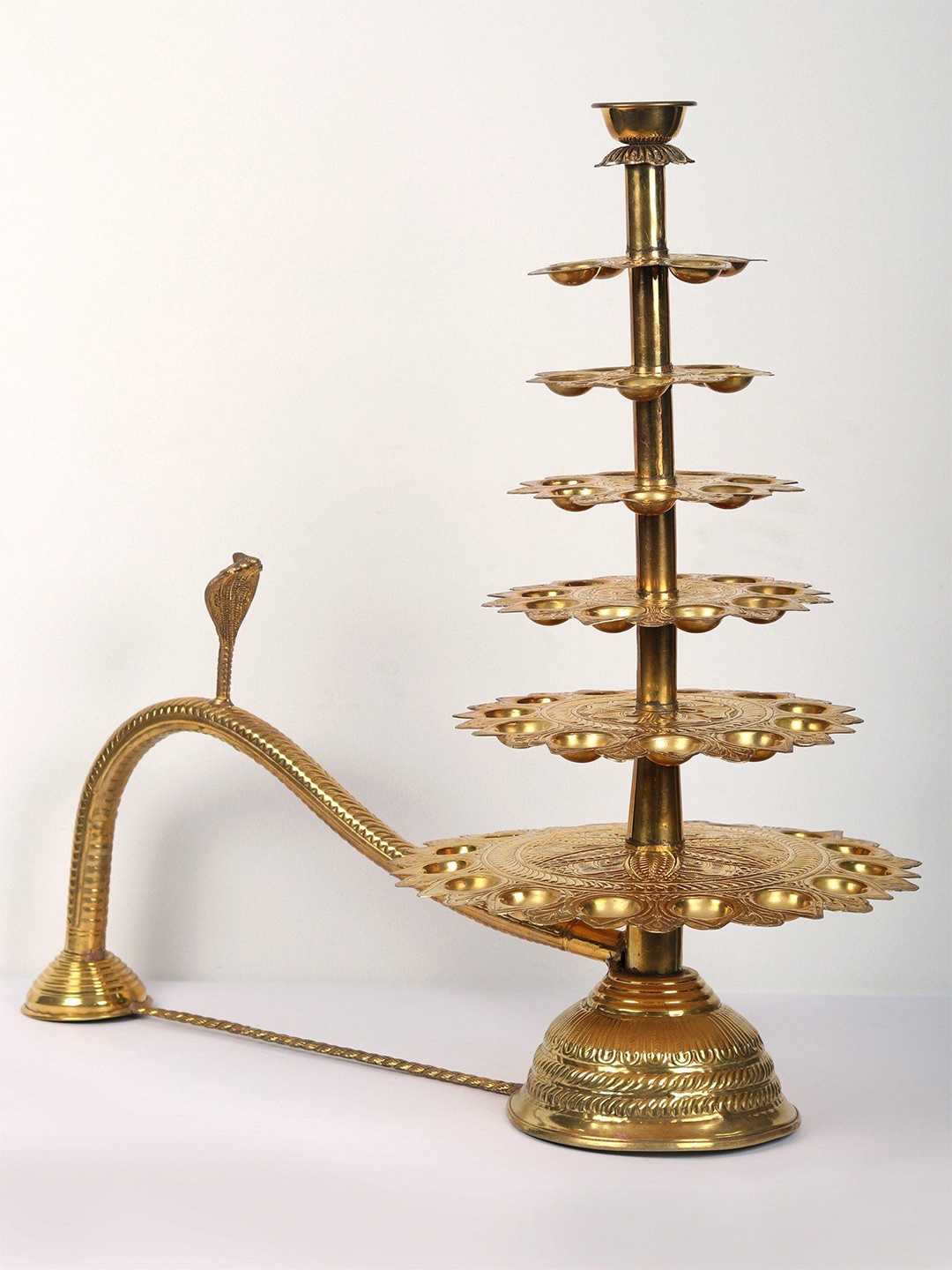 

Exotic India 6 Layer Brass Hand-Held Oil Lamp, Gold