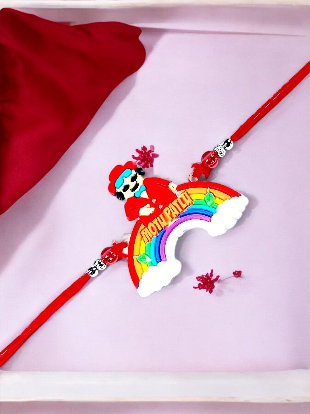 

ADIVA Motu Patlu Thread Rakhi With Roli Chawal, Red