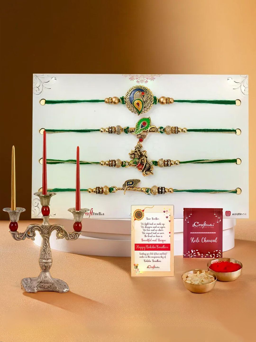 

eCraftIndia Set of 5 Designer Rakhis With 3 Arm Candle Holder Stand Gift Set, Gold