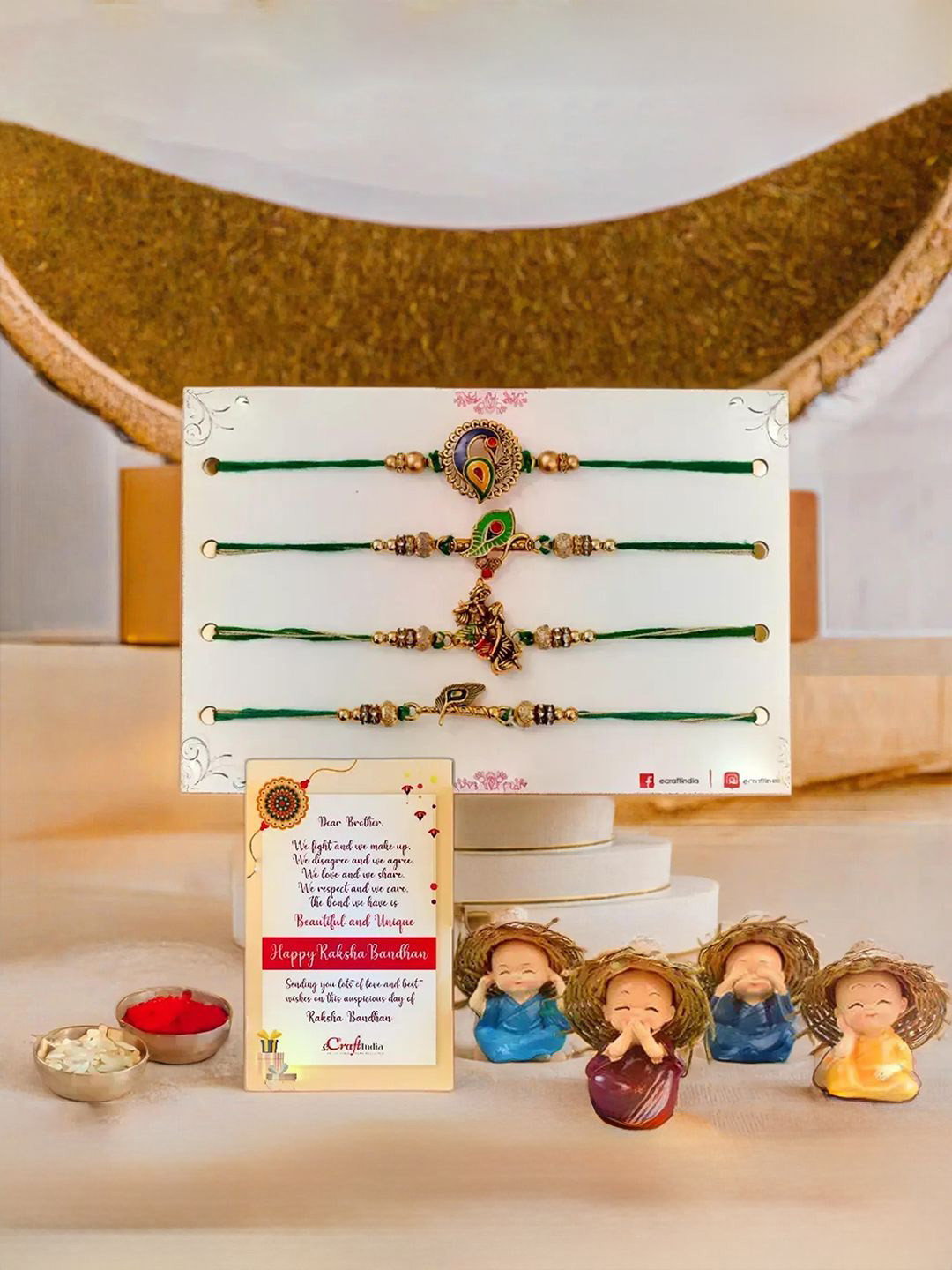 

eCraftIndia Set of 4 Designer Rakhis With Baby Monk Buddha Statues, Gold
