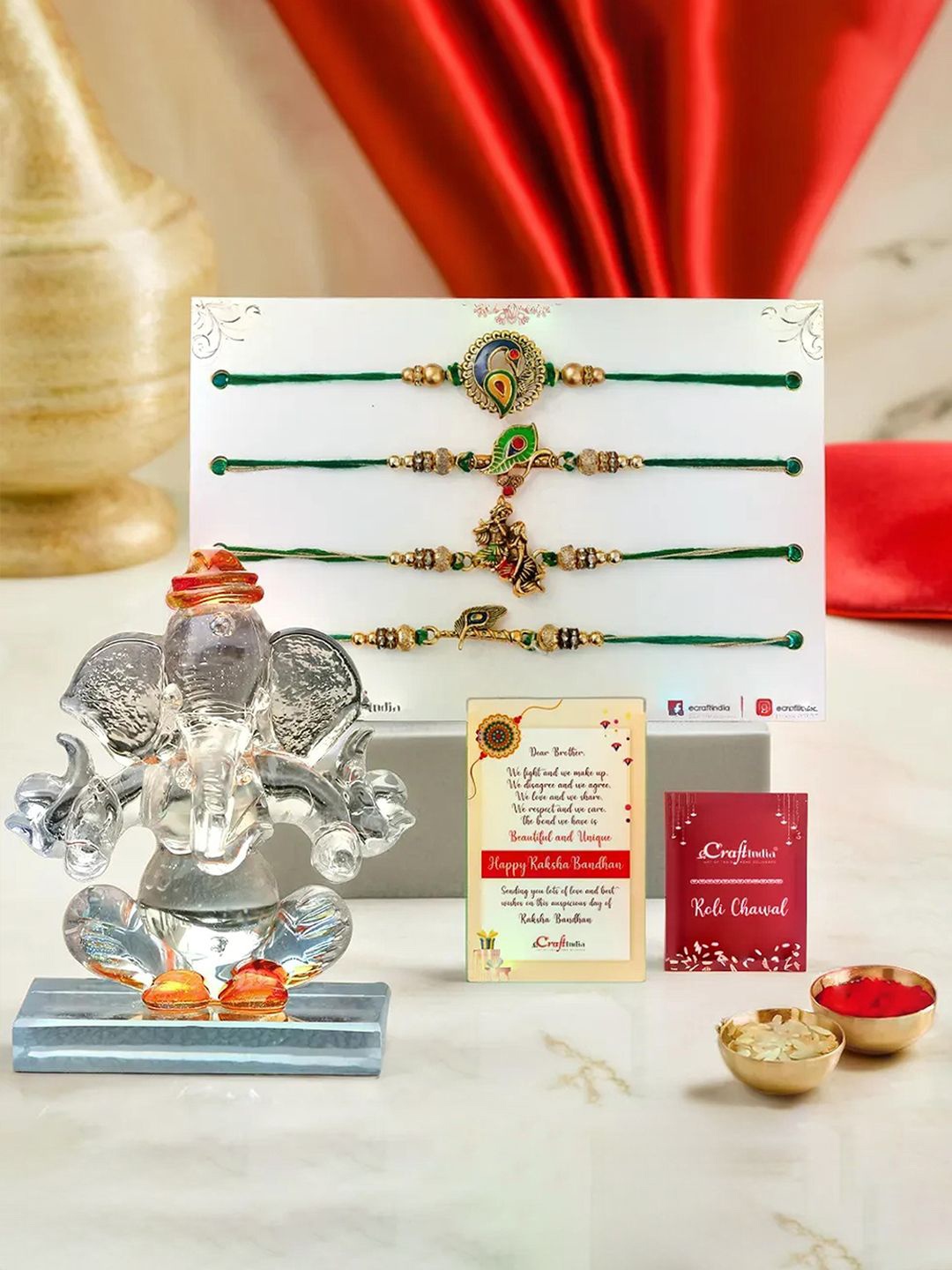 

eCraftIndia Set of 5 Thread Rakhi & Lord Ganesha Idol With Roli Chawal, Gold