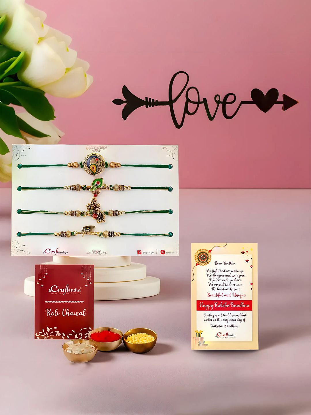 

eCraftIndia Set Of 4 Rakhis With Wall Art And Greeting Card & Roli Chawal, Gold