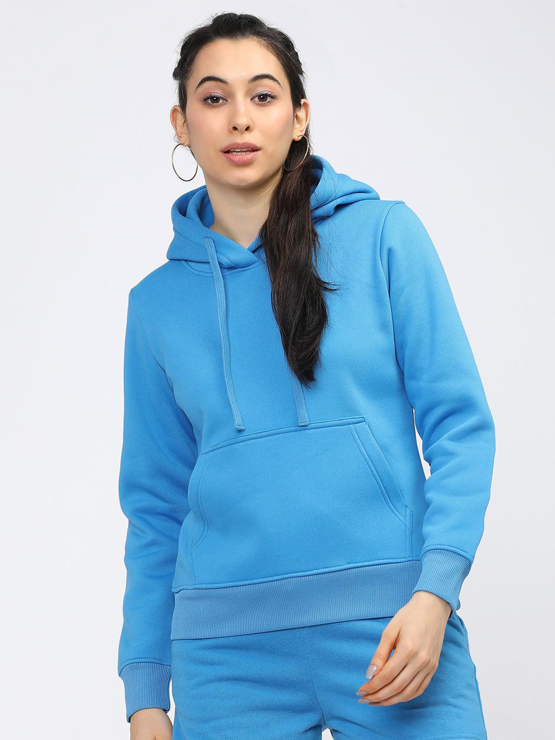 

Tokyo Talkies Women Solid Hooded Sweatshirt, Blue