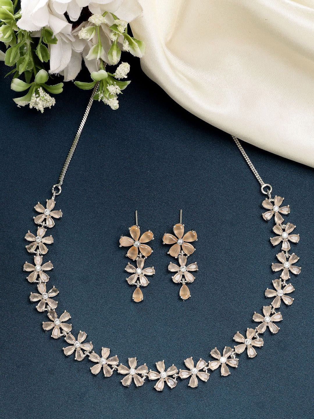 

ZENEME Rhodium-Plated American Diamond Studded Floral Necklace and Earrings, Silver