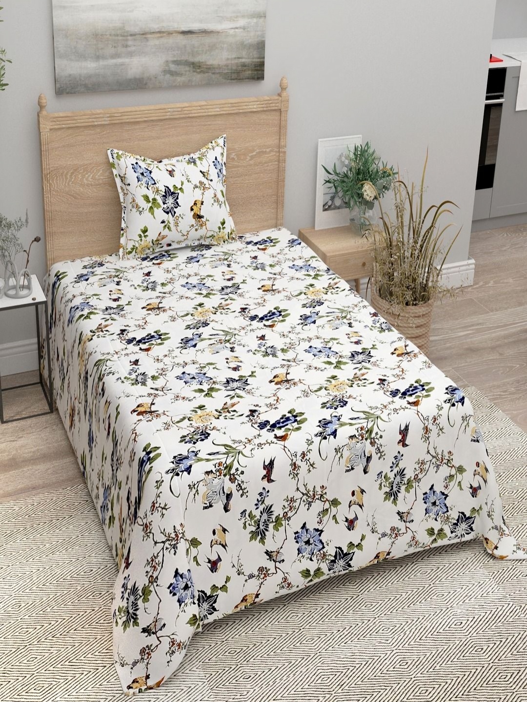 

Aura Black & White Floral 144 TC Single Bedsheet with 1 Pillow Covers