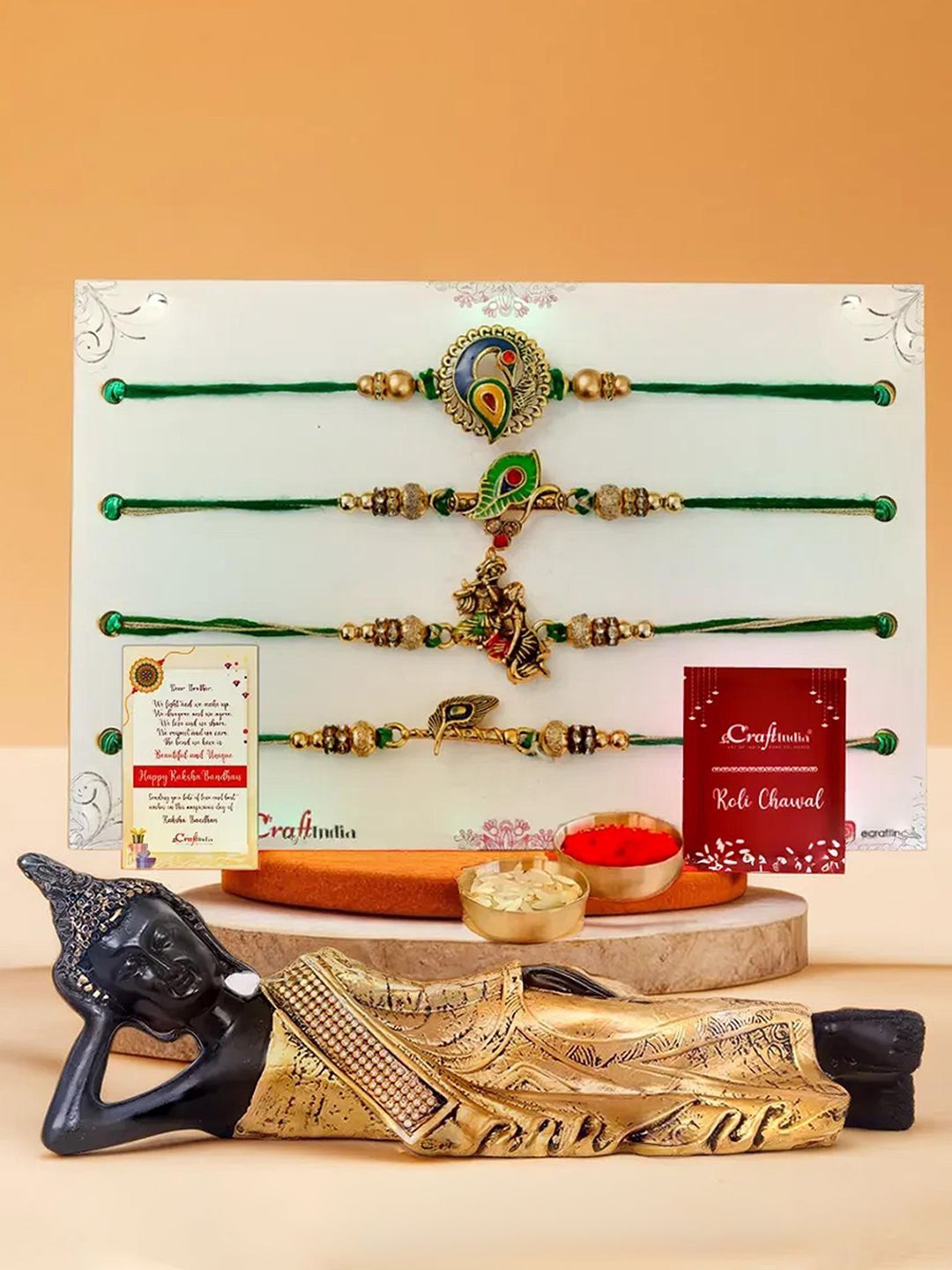 

eCraftIndia Set Of 5 Rakhi With Lord Buddha Idol & Greeting Card & Roli Chawal Gift Set, Gold