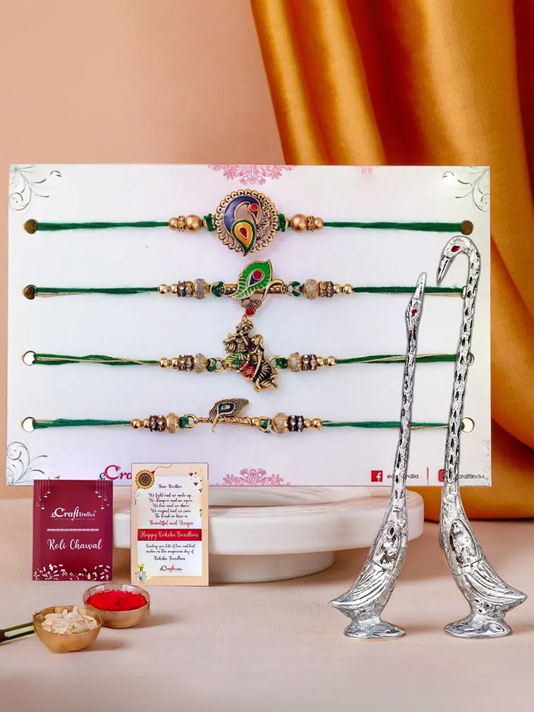 

eCraftIndia Set of 5 Thread Rakhi & Metal Swan With Roli Chawal, Gold