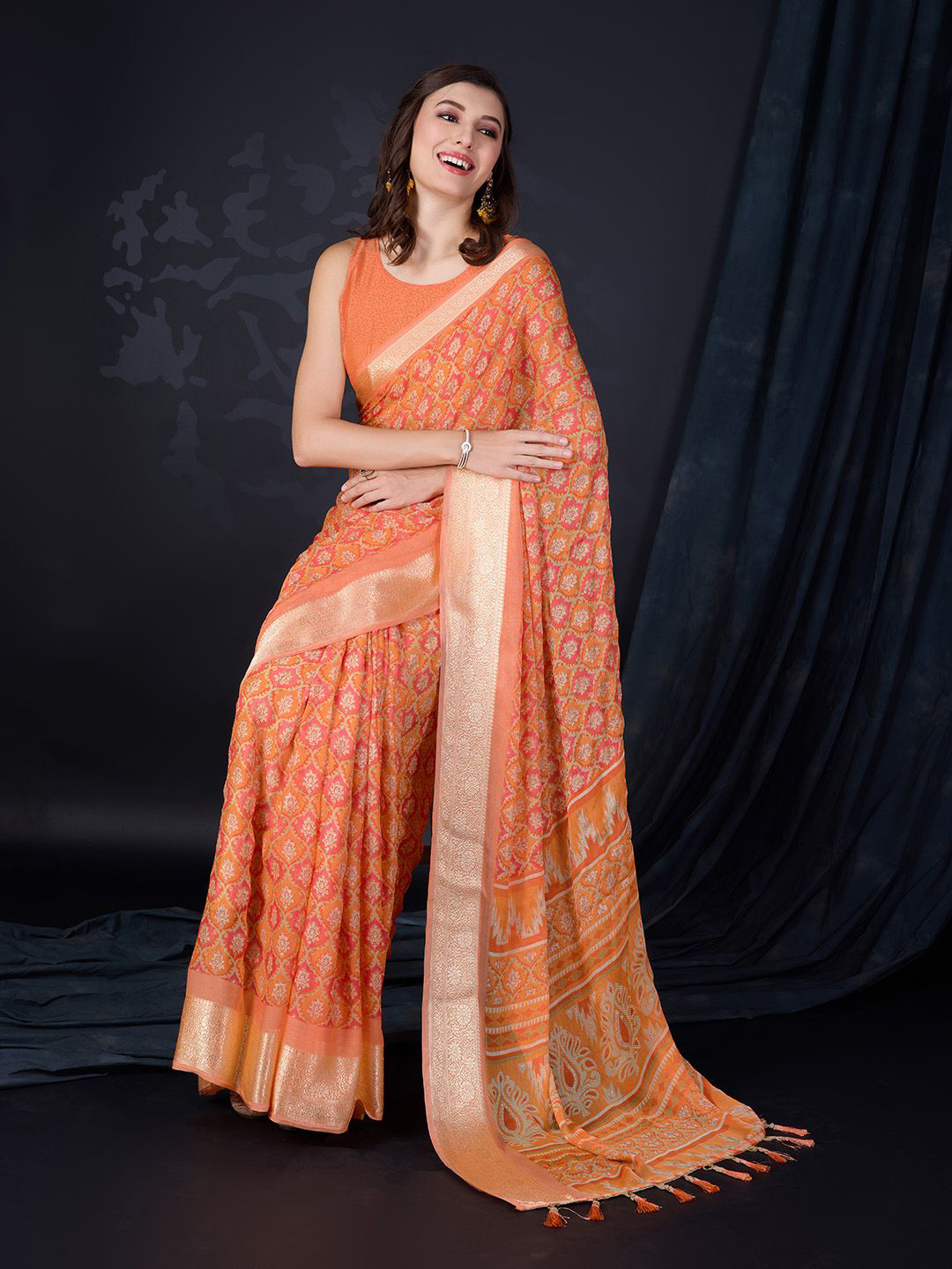 

Ishin Ethnic motifs Printed Saree, Orange