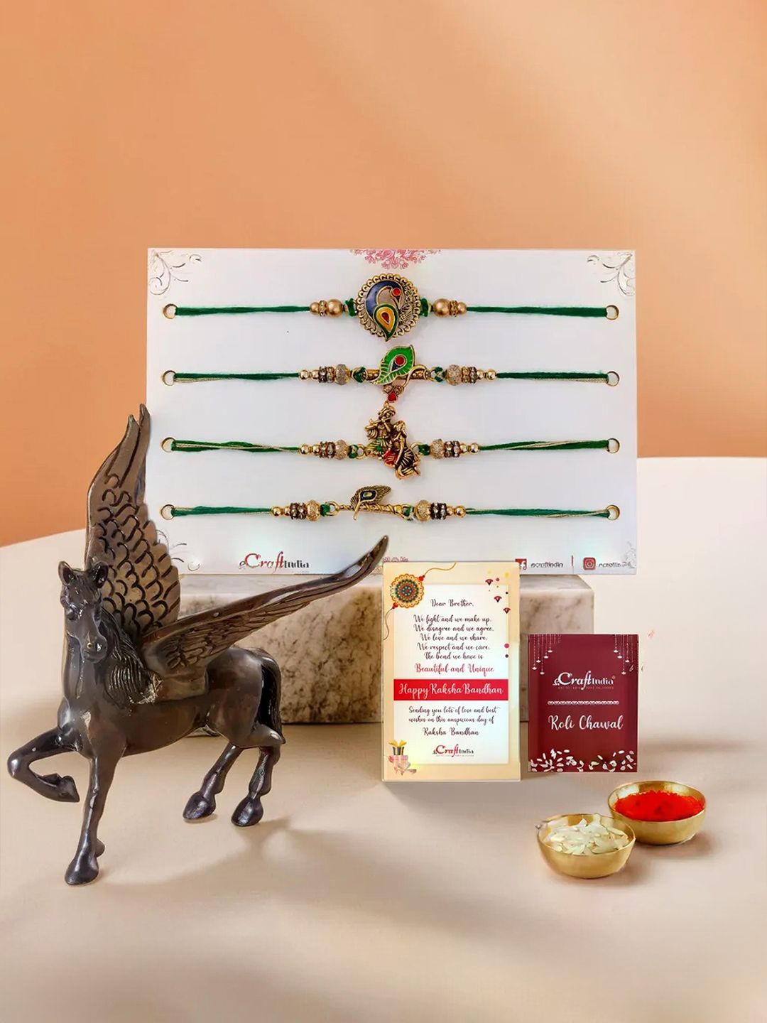 

eCraftIndia Set Of 4 Radha Krishna & Peacock Rakhi With Flying Angel Horse Statue, Green