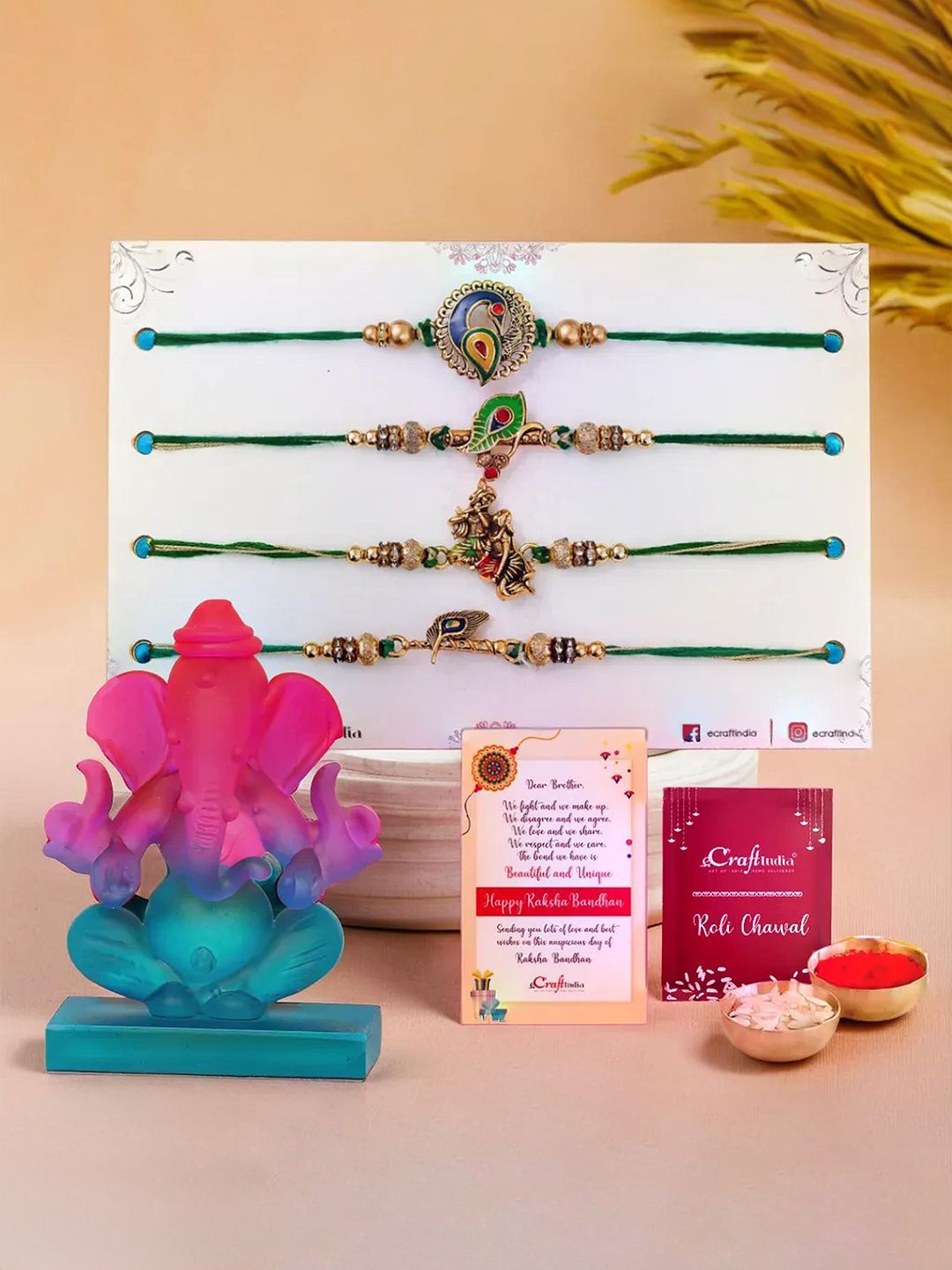 

eCraftIndia Set of 5 Thread Rakhi & Crystal Ganesha Idol With Roli Chawal, Pink