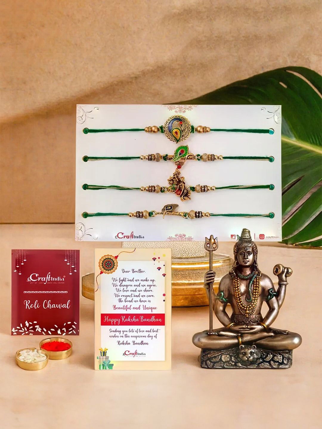 

eCraftIndia Set Of 4 Rakhi With Meditating Lord Shiva Statue & Roli Chawal Gift Set, Gold