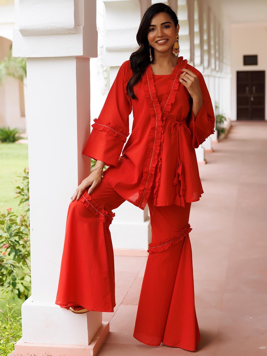 

Ragavi Pure Cotton Ruffle Round Neck Top With Jacket & Sharara Pant, Red