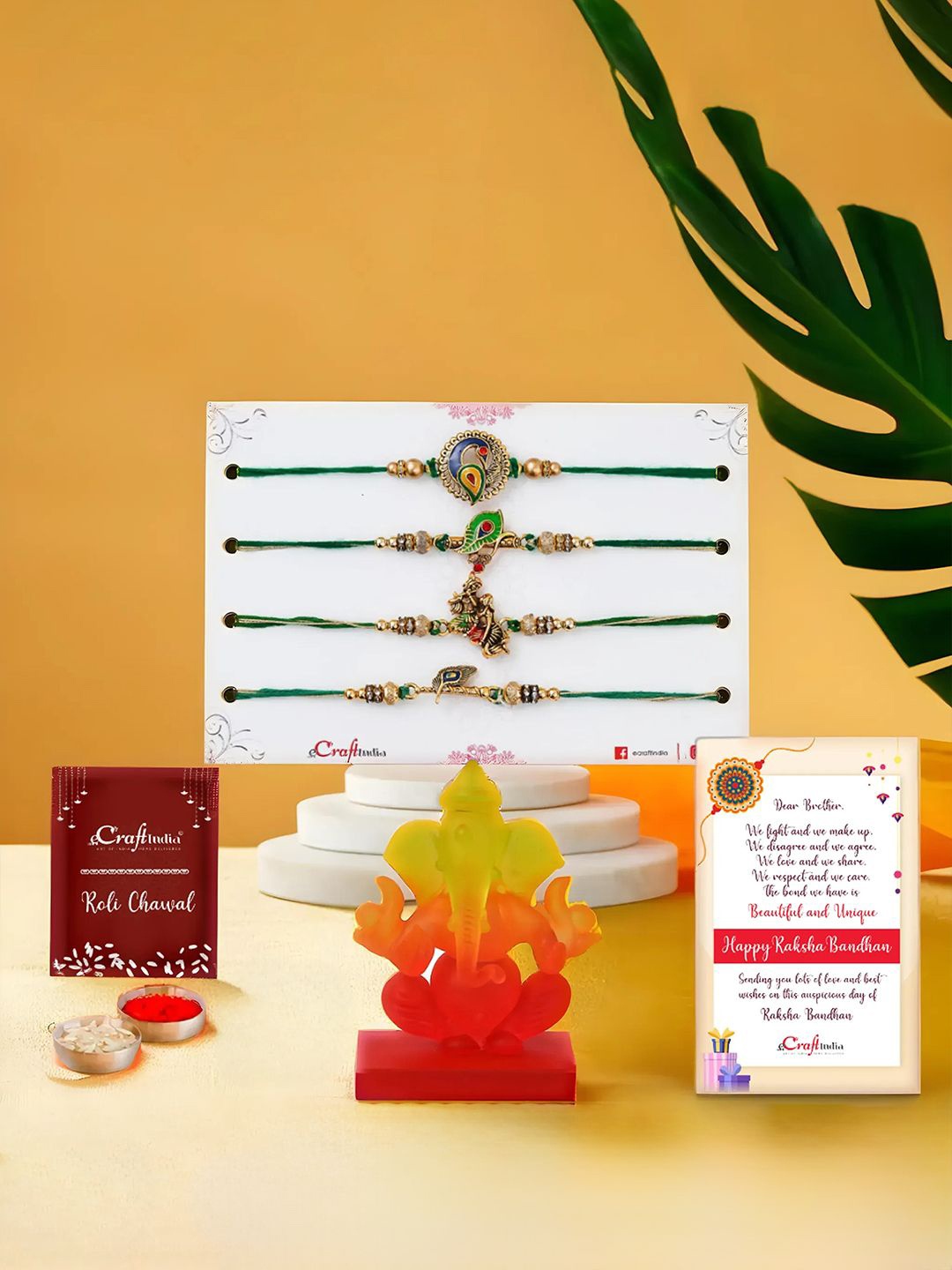 

eCraftIndia Set Of 4 Rakhi With Idol & Greeting Card & Roli Chawal Gift Set, Gold