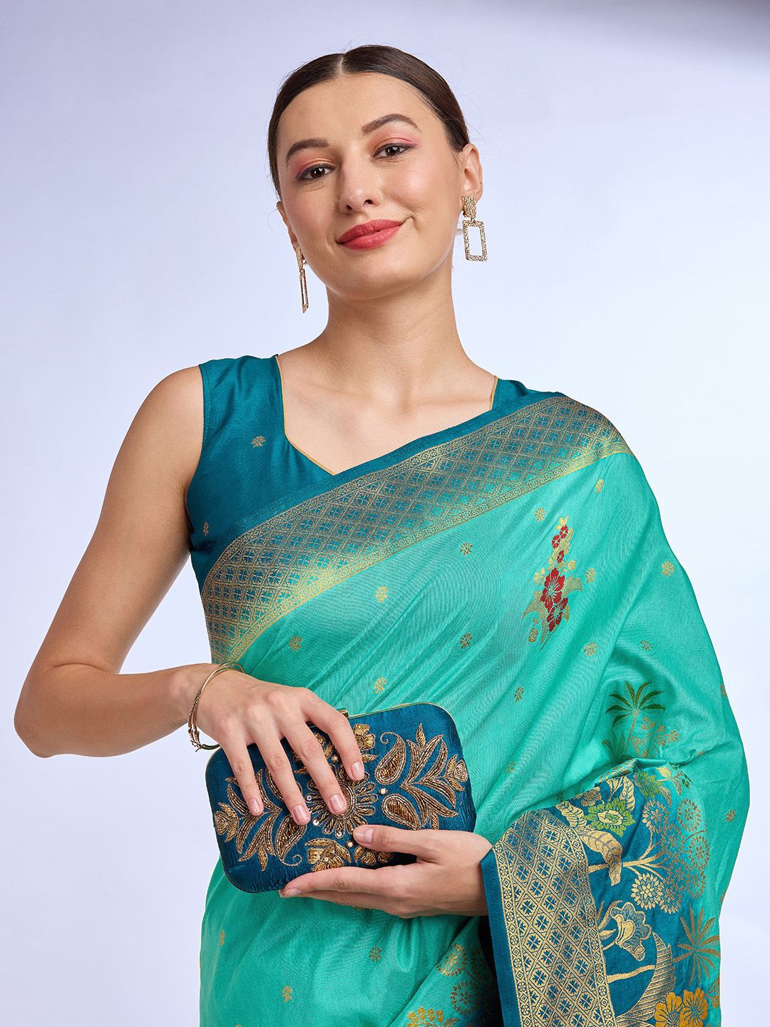 

Ishin Woven Design Floral Zari Saree, Teal