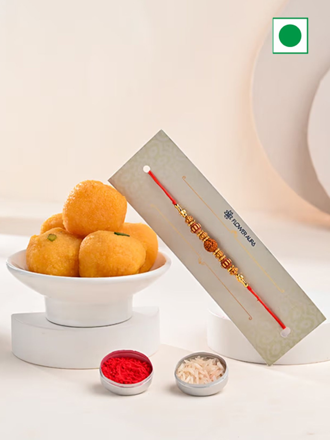 

Floweraura Rakhi With Motichoor Ladoo 250 g, Red