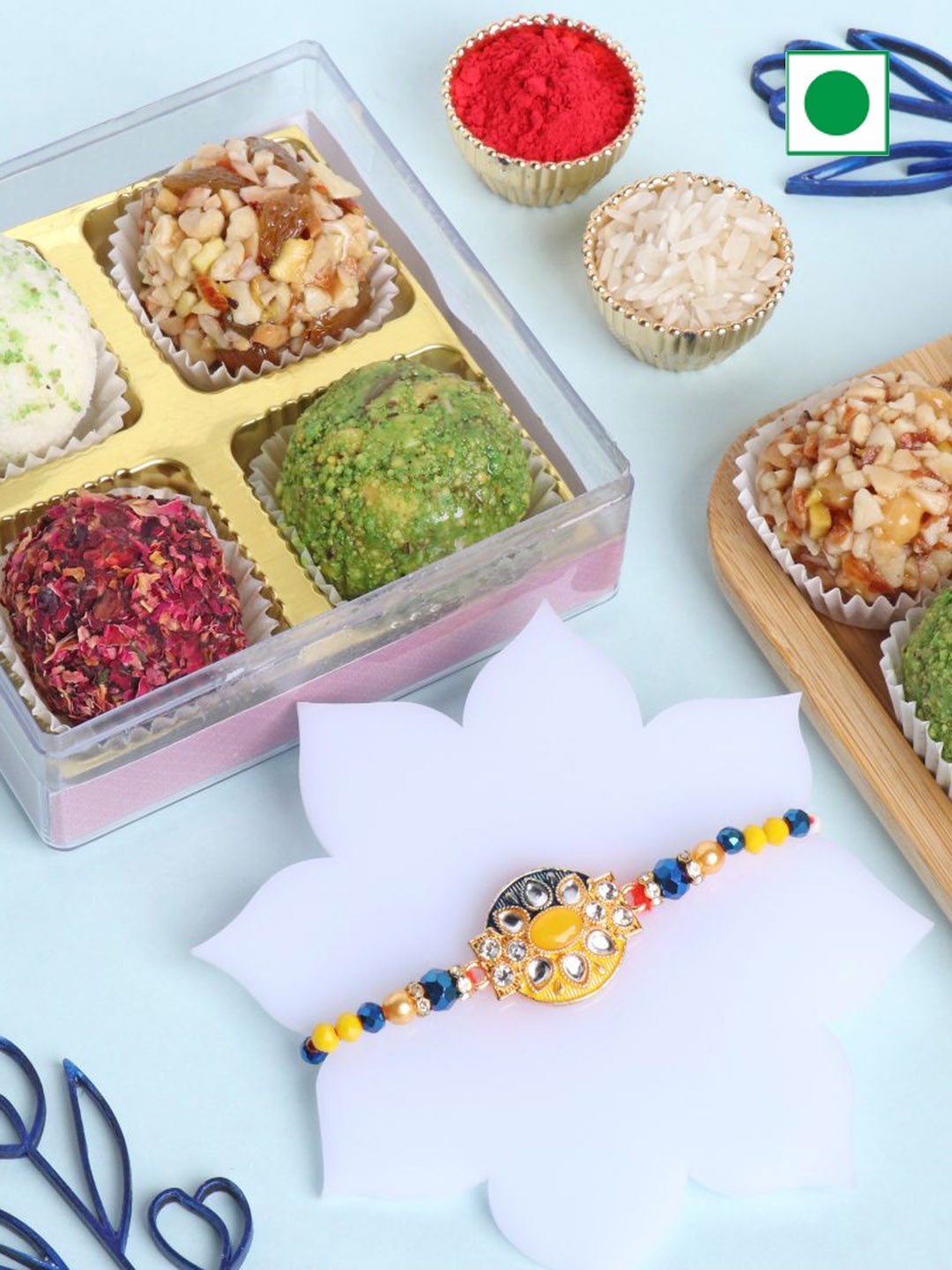 

Floweraura Rakhi With Pack Of 4 Assorted Mix Dryfruit Fusion Laddoo, Red