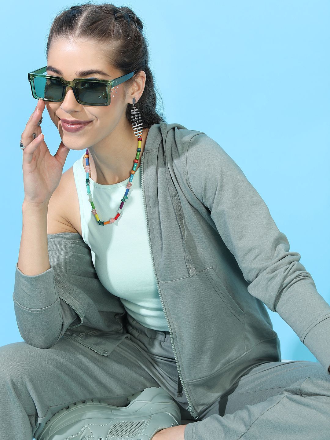 

Tokyo Talkies Women Solid Hooded Sweatshirt, Grey