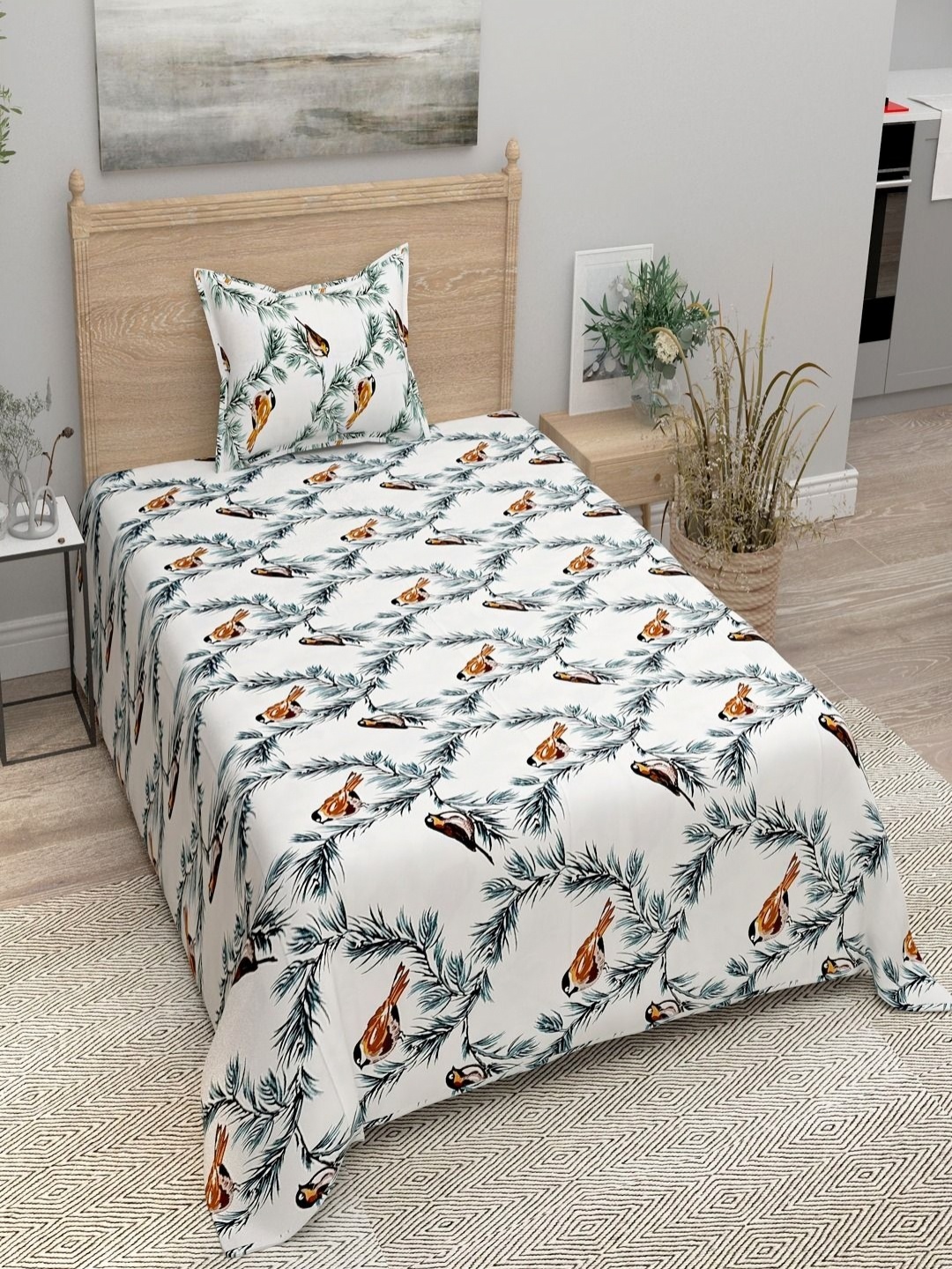 

Aura Black & White Floral 144 TC Single Bedsheet with 1 Pillow Covers