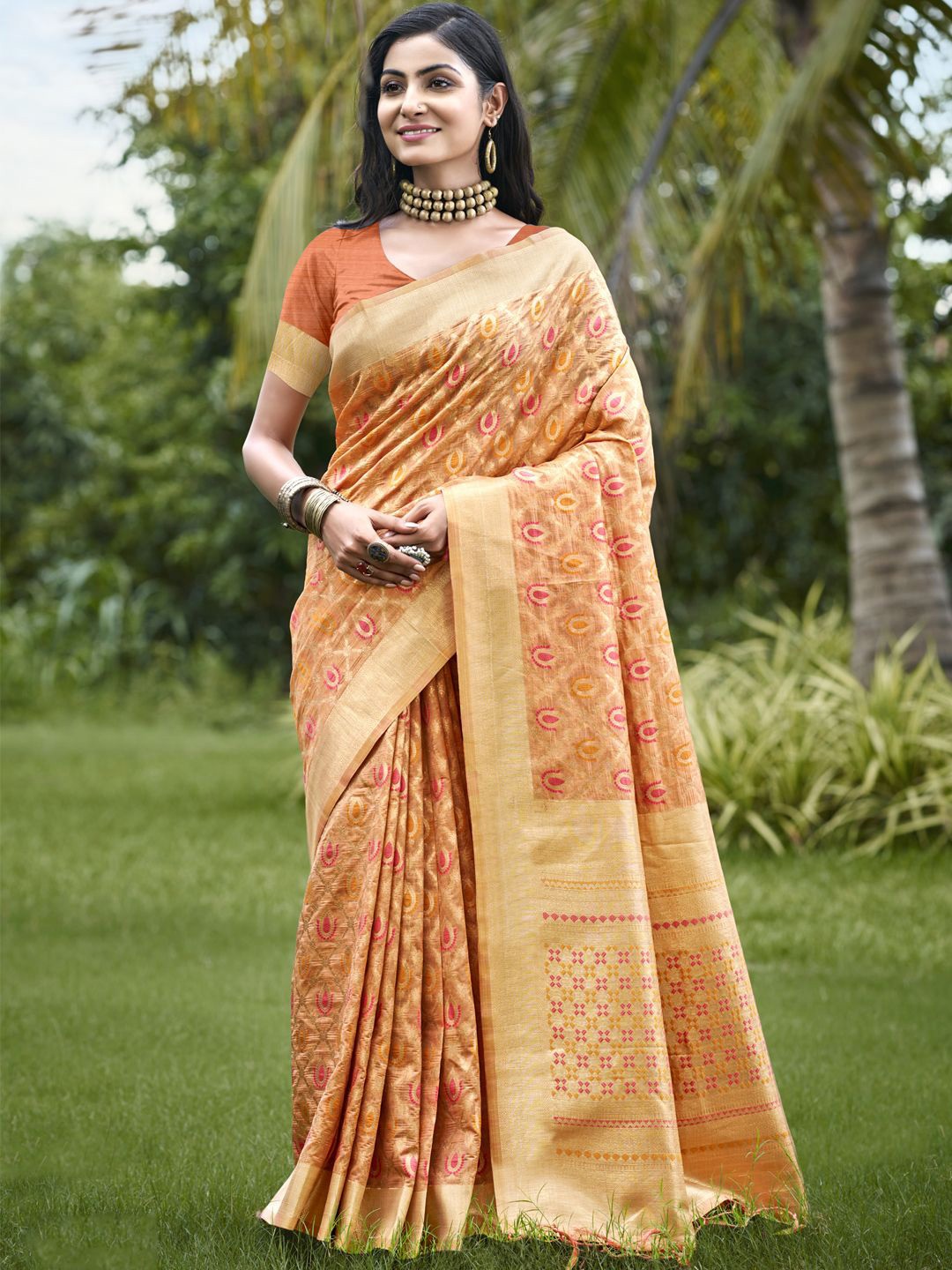 

Exclusiva Organza Woven Design Saree with Zari Border, Orange