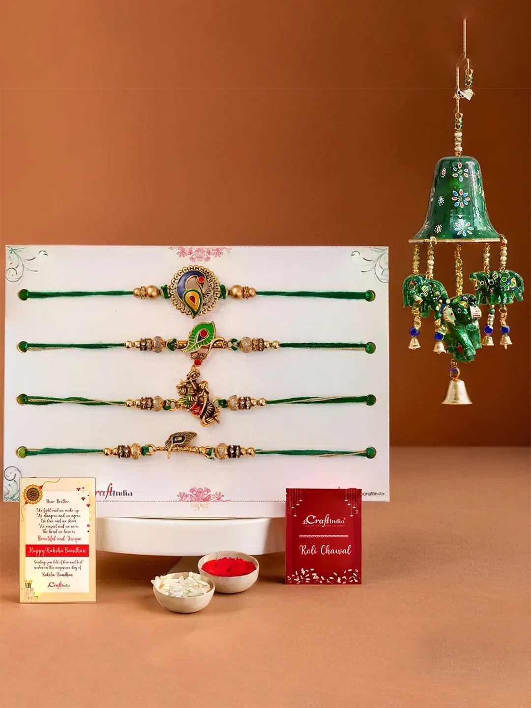 

eCraftIndia Set of 4 Designer Rakhi With Bell Elephant Wall Hanging, Gold