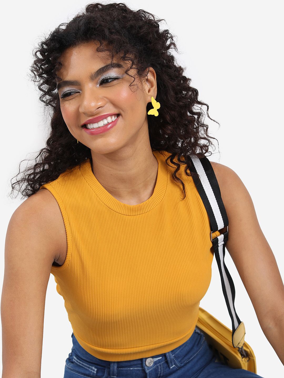 

Tokyo Talkies Women Solid Knits Round Neck Top, Yellow